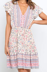 Robe bohème à boutons décoratifs et manches flottantes